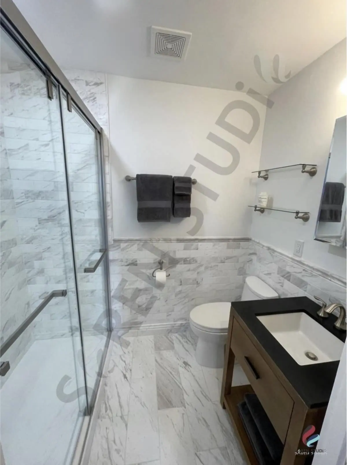 Marble bathroom shower and vanity