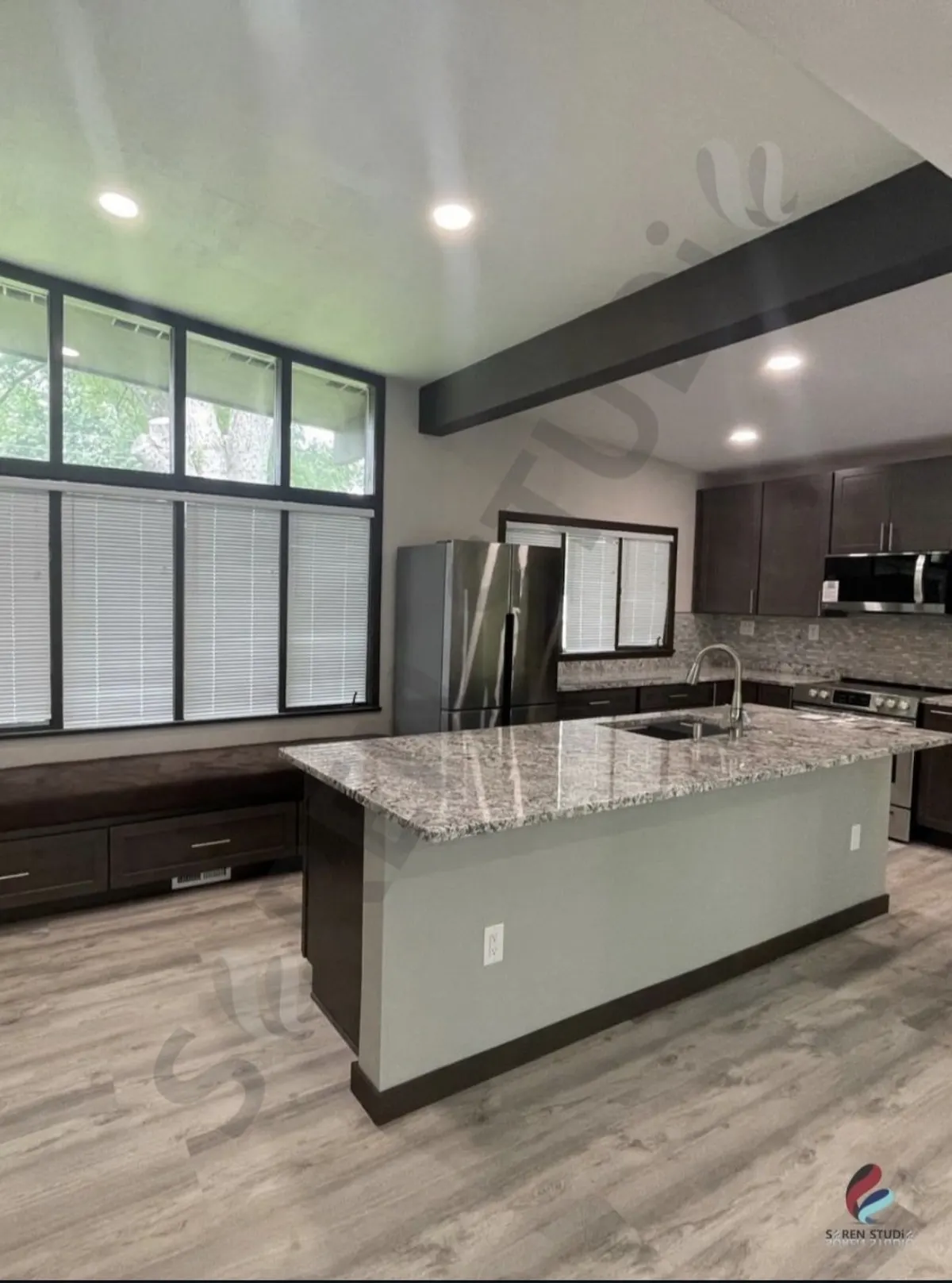 Kitchen island with dark beam detail